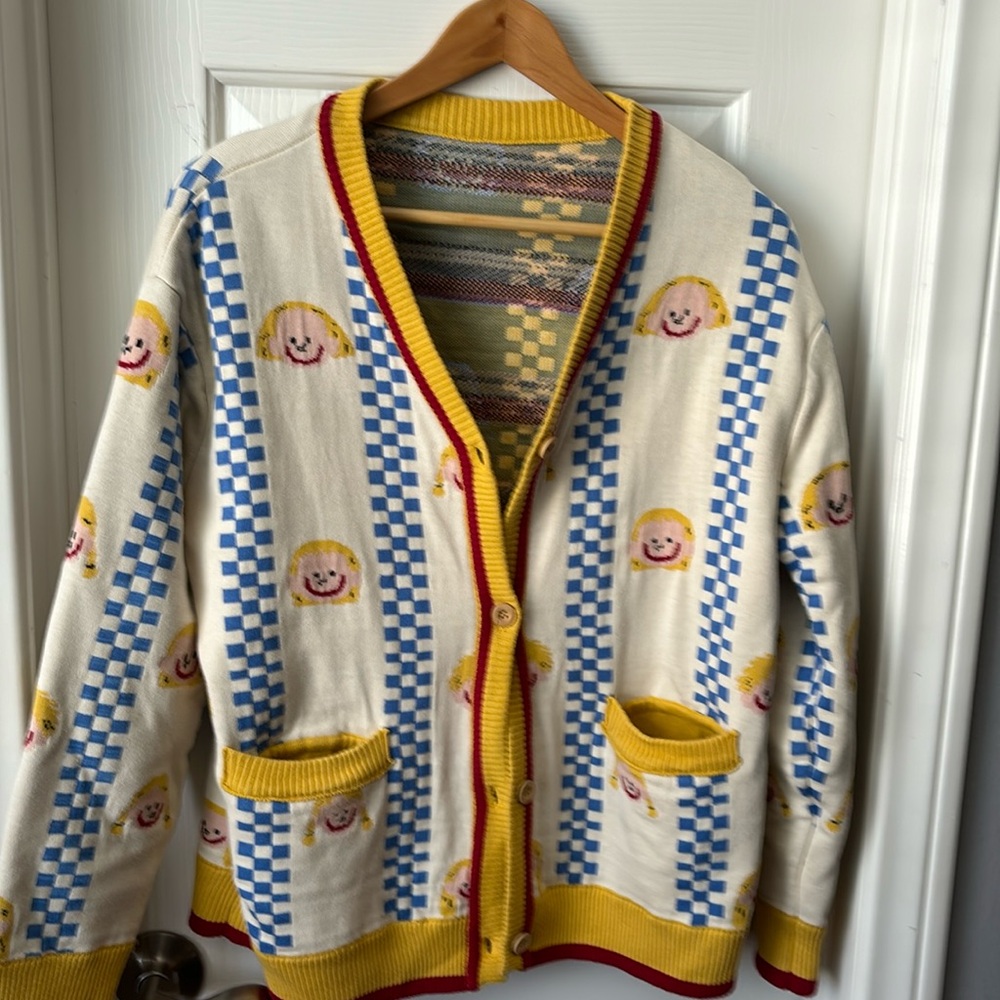 Handmade vintage cardigan would fit a women’s large size
